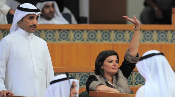 Kuwaiti elected female lawmaker Dra. Aseel Al Awadhi and Marzooq Al ghanim (L) during the reopening of Kuwait National Assembly in Kuwait, on Sunday, May 31, 2009.